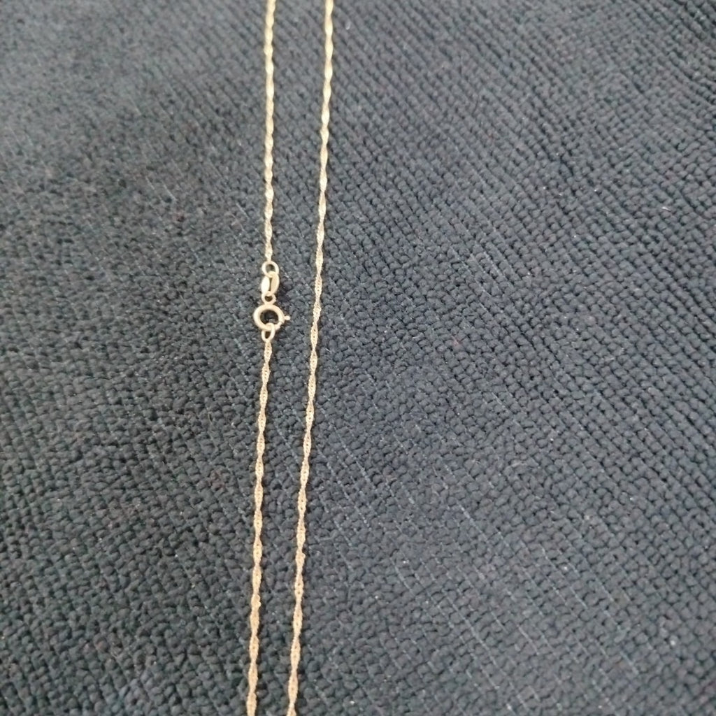 CADENA,MEDALLA RELIGIOSA ORO 10 K 1,60 GRMS (SEMINUEVO)