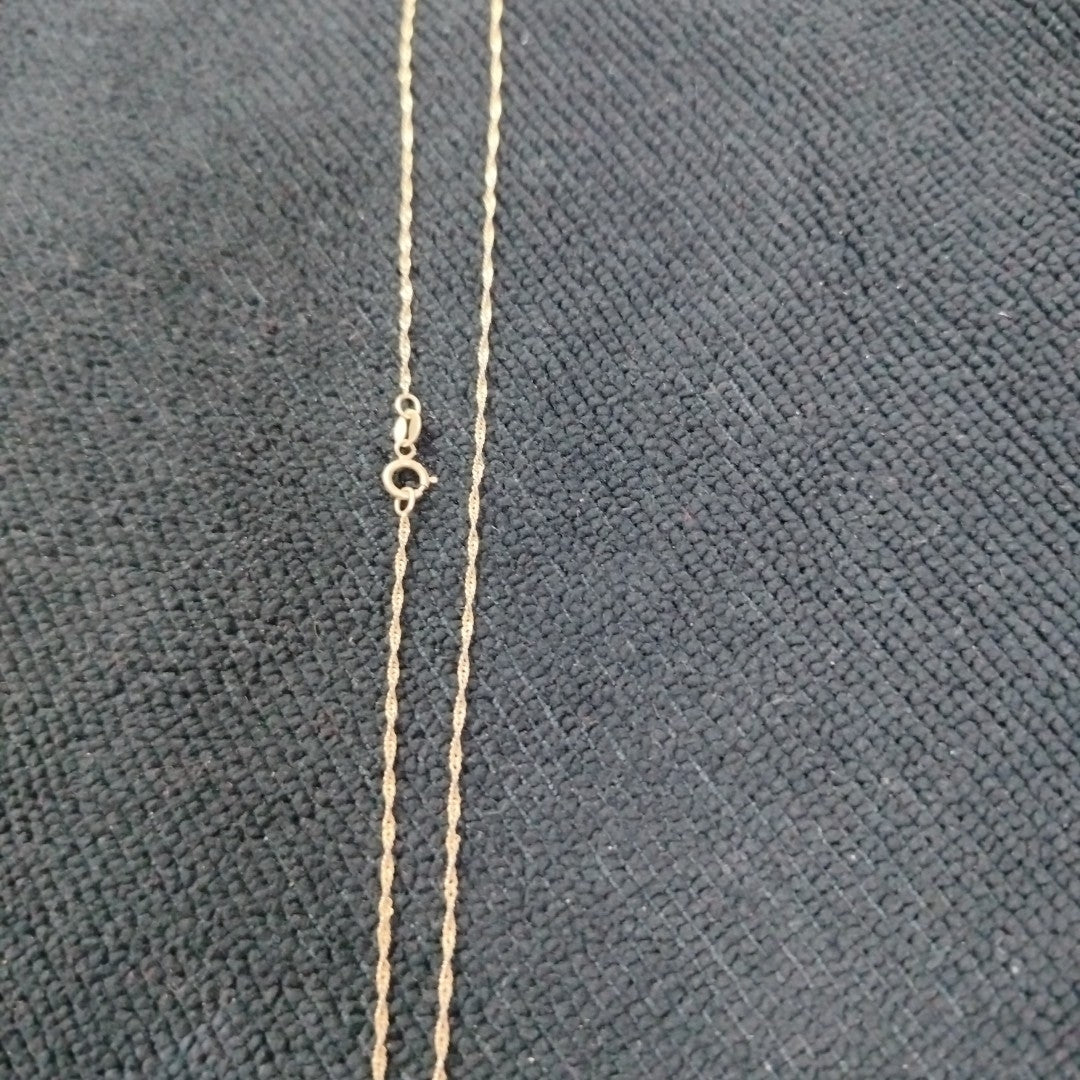 CADENA,MEDALLA RELIGIOSA ORO 10 K 1,60 GRMS (SEMINUEVO)