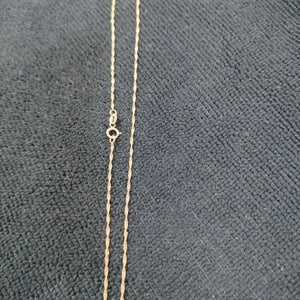 CADENA,MEDALLA RELIGIOSA ORO 10 K 1,60 GRMS (SEMINUEVO)