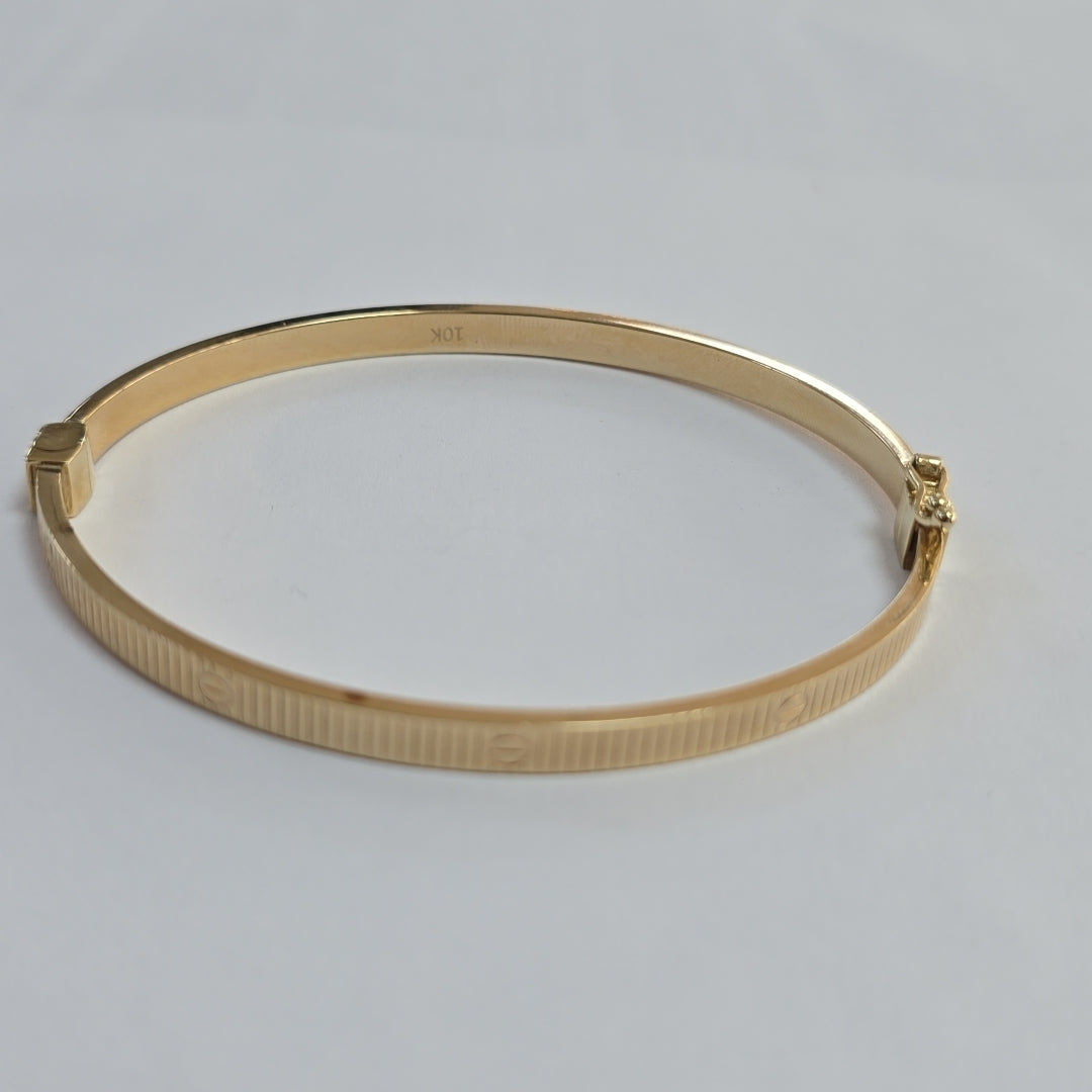 PULSERA RIGIDA ORO 10 K 6.6 GRMS (SEMINUEVO)
