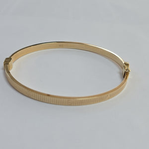 PULSERA RIGIDA ORO 10 K 6.6 GRMS (SEMINUEVO)