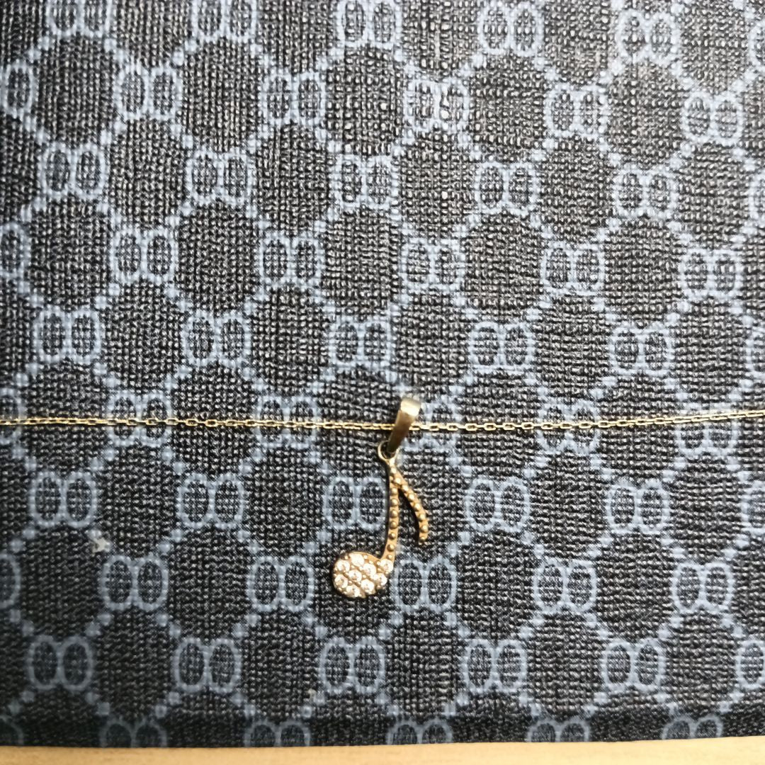 CADENA,DIJE ORO 10 K 1,40 GRMS (SEMINUEVO)
