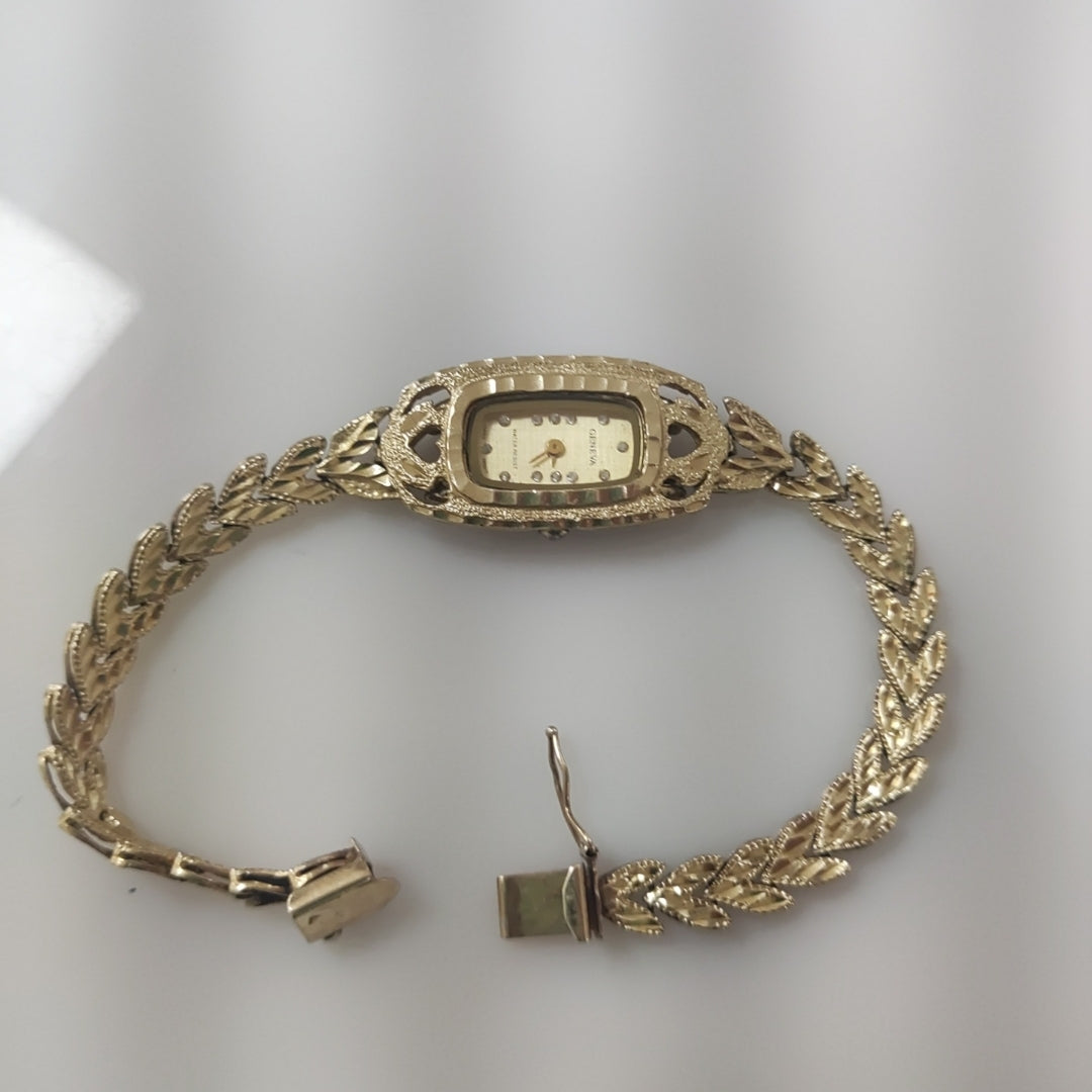 RELOJ CAJA ACERO PULSO ORO ORO 14 K 22 GRMS (SEMINUEVO)