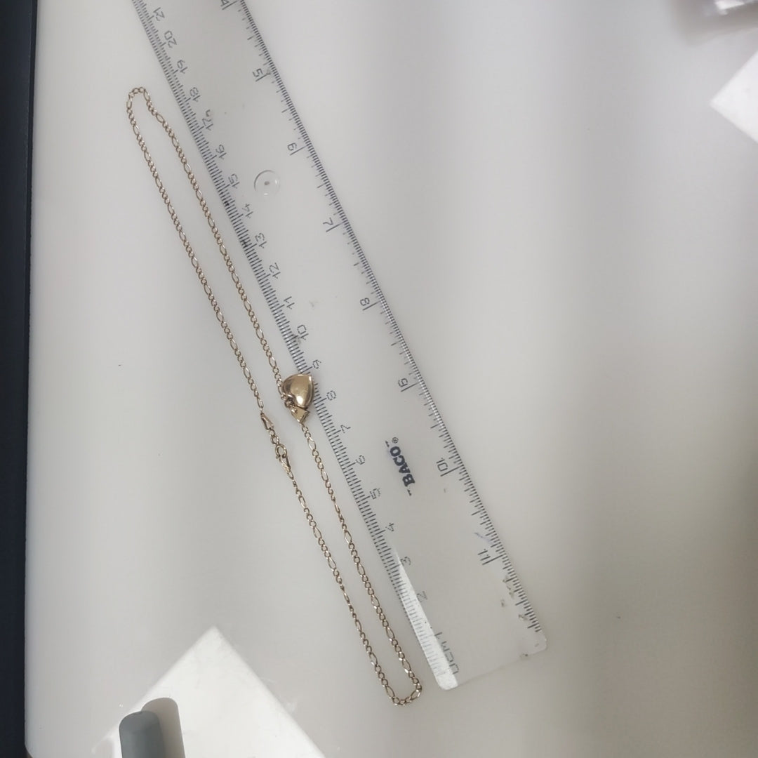 CADENA, DIJE ORO 10 K 2.5 GRMS (SEMINUEVO)