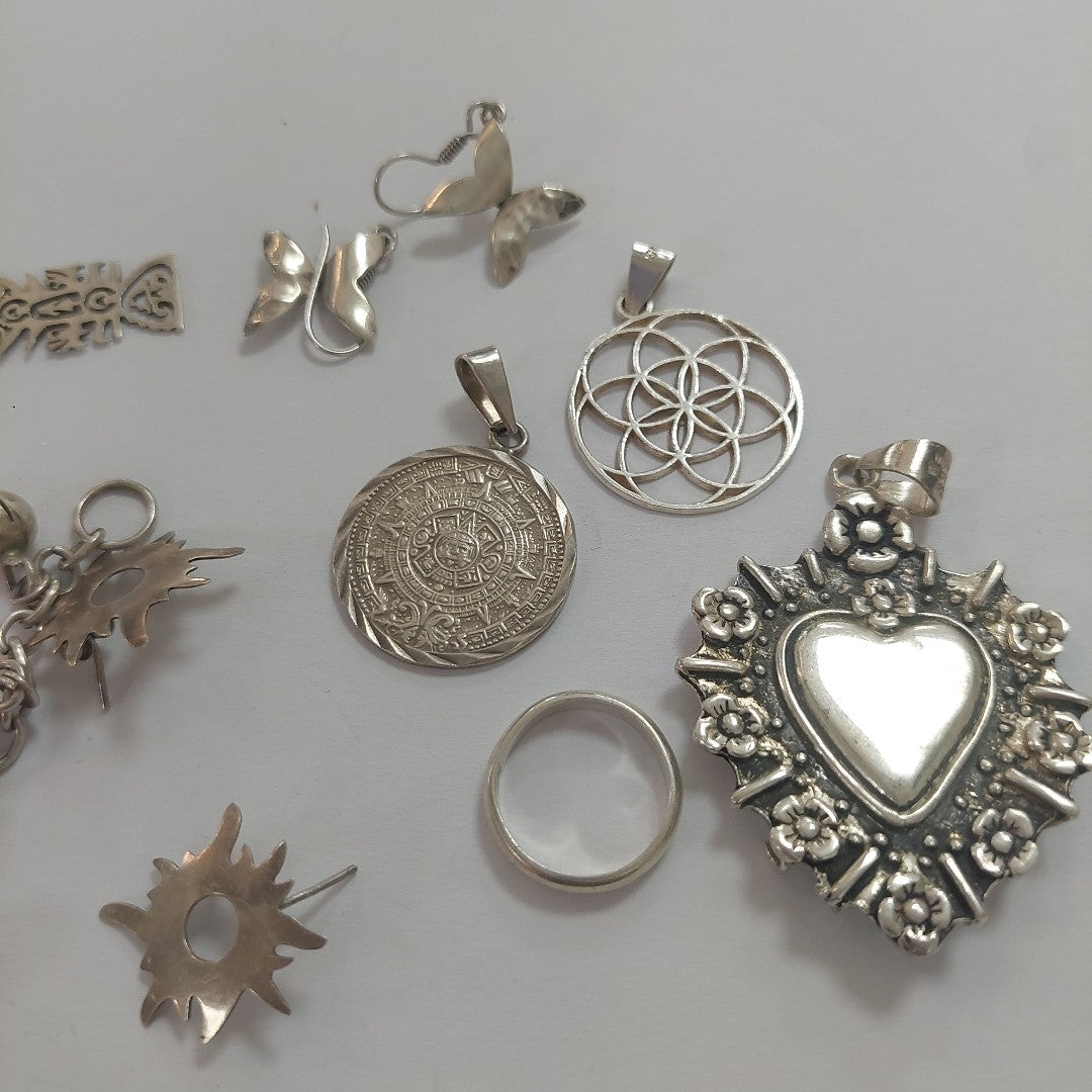 ARETES PAR,DIJE,PULSERA PLATA 65,80 GRMS (SEMINUEVO)