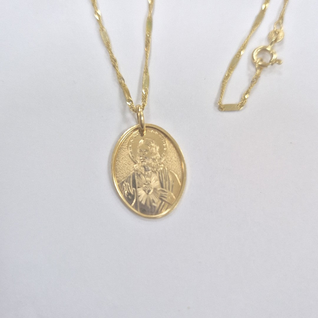 CADENA,MEDALLA RELIGIOSA ORO 10 K 3,50 GRMS (SEMINUEVO)