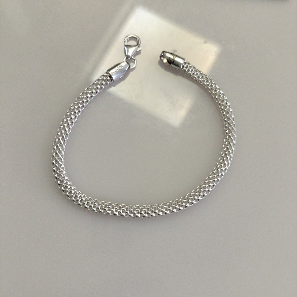 PULSERA TEJIDO ESPECIAL PLATA .925 18 CM 4.9 GR (NUEVO)