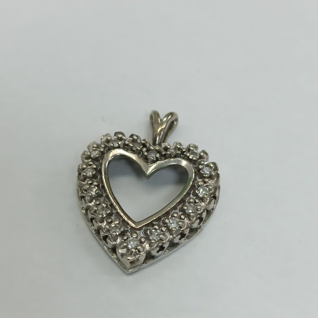 DIJE ORO BLANCO 10 K 3,40 GRMS (SEMINUEVO)