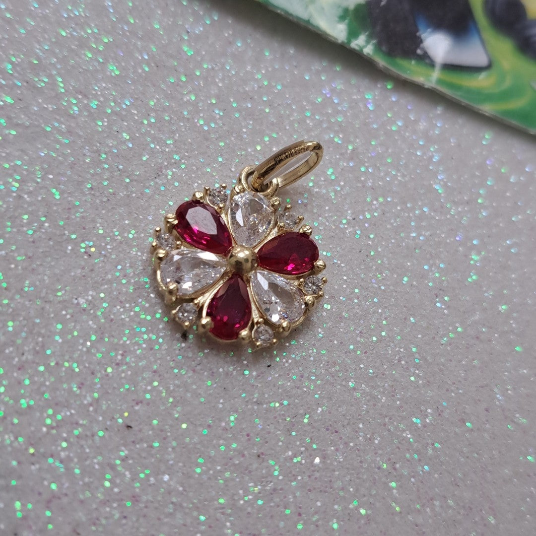 DIJE FLOR CIRCONIAS Y PIEDRAS DE COLOR 14K 2.8 GR (NUEVO)