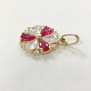 DIJE FLOR CIRCONIAS Y PIEDRAS DE COLOR 14K 2.8 GR (NUEVO)