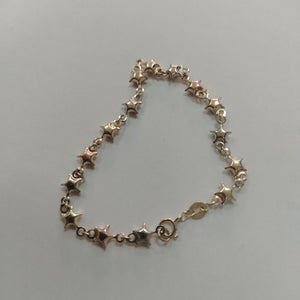 PULSERA TEJIDO ESPECIAL ESTRELLAS COMBINADAS 14K 18 CM 2.3 GR (NUEVO)
