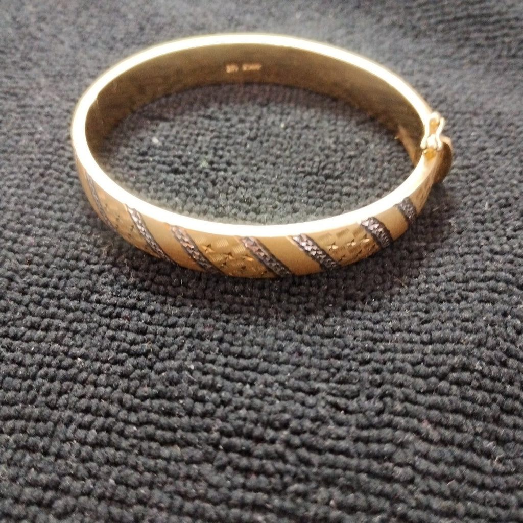 PULSERA RIGIDA ORO COMBINADO 14 K 16,50 GRMS (SEMINUEVO)