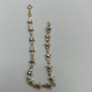 PULSERA TEJIDO ESPECIAL ESTRELLAS COMBINADAS 14K 18 CM 2.3 GR (NUEVO)