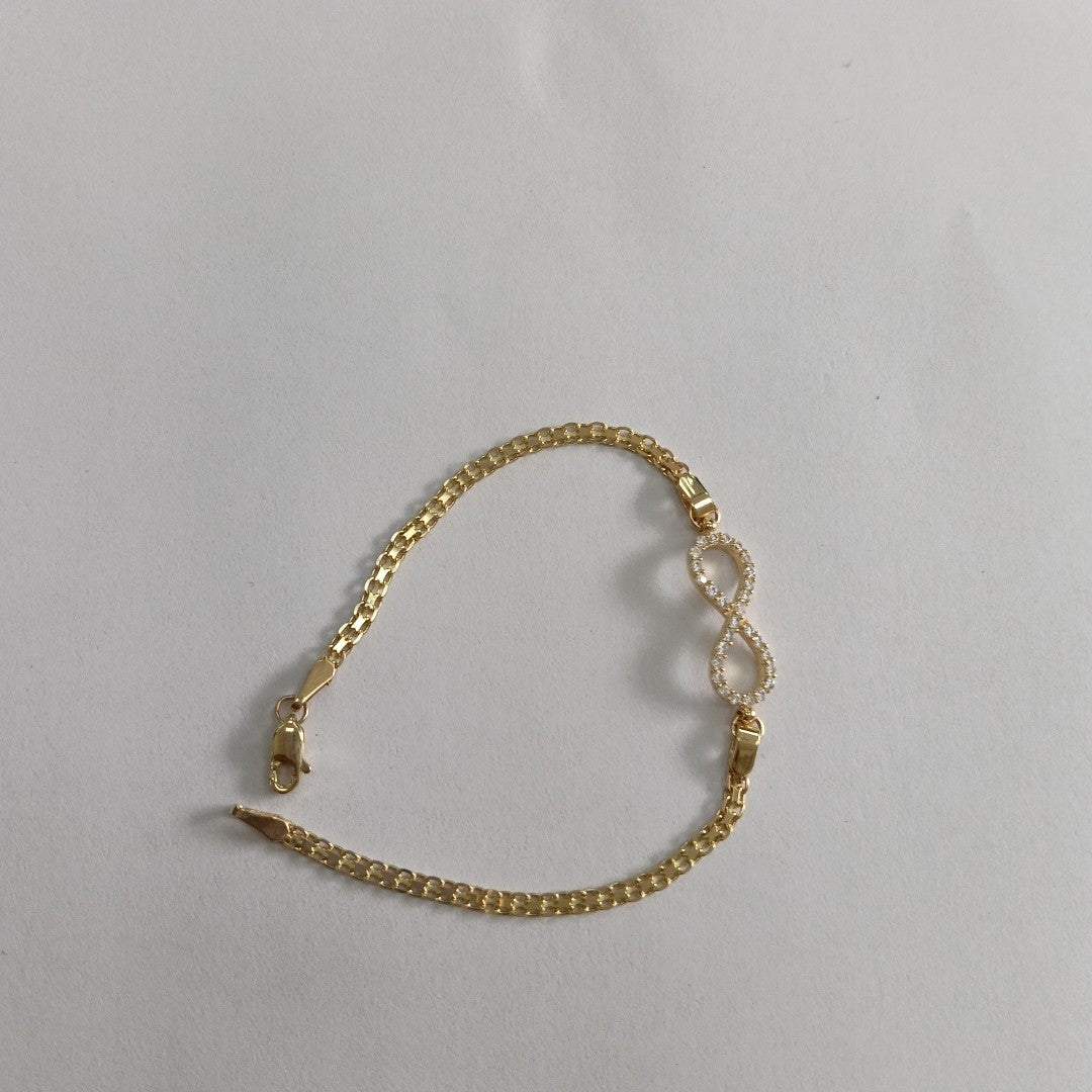 PULSERA TEJIDO ESPECIAL CON INFINITO Y CIRCONIAS 14K 18 CM 3.4 GR (NUEVO)