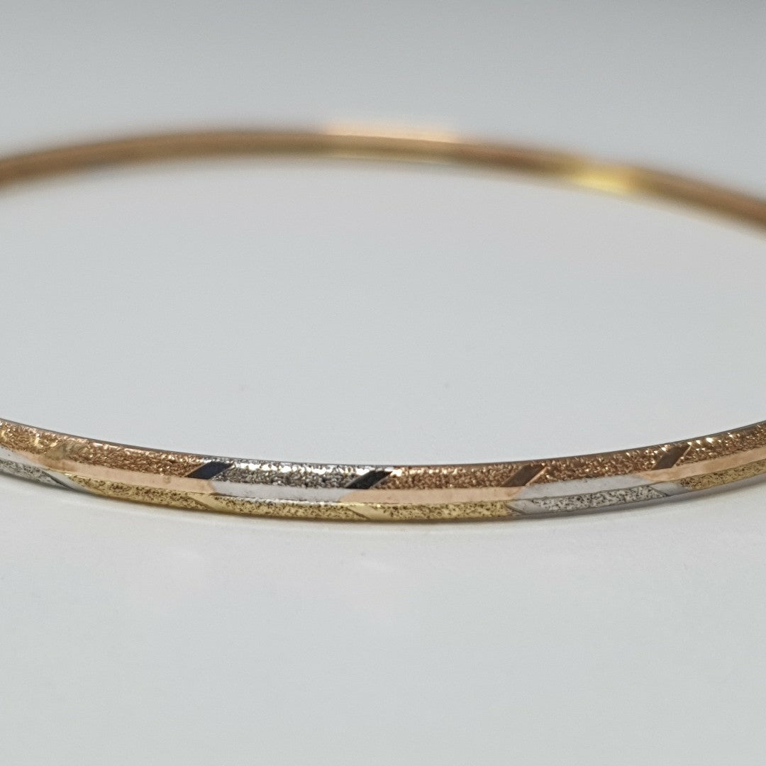PULSERA RIGIDA ORO COMBINADO 10 K 3,30 GRMS (SEMINUEVO)