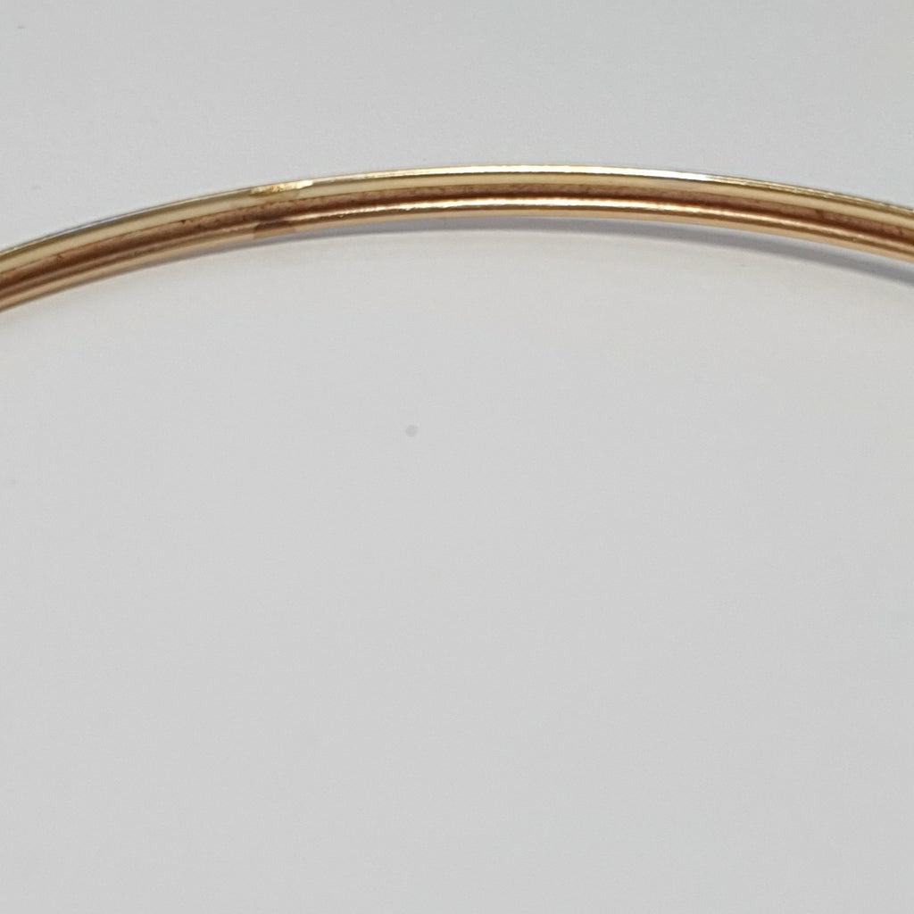 PULSERA RIGIDA ORO COMBINADO 10 K 3,40 GRMS (SEMINUEVO)