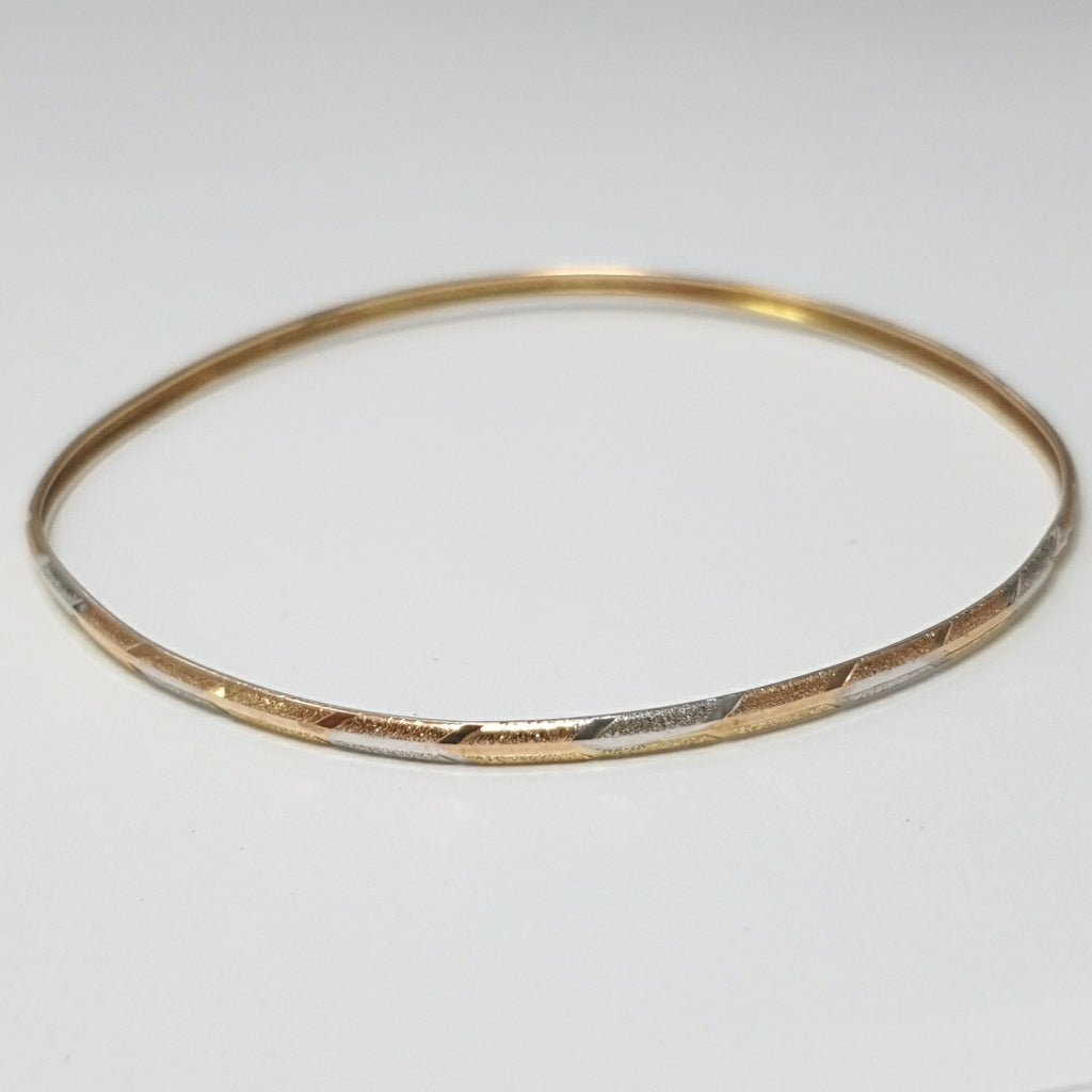 PULSERA RIGIDA ORO COMBINADO 10 K 3,10 GRMS (SEMINUEVO)