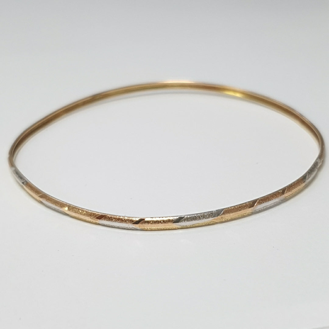 PULSERA RIGIDA ORO COMBINADO 10 K 3,10 GRMS (SEMINUEVO)