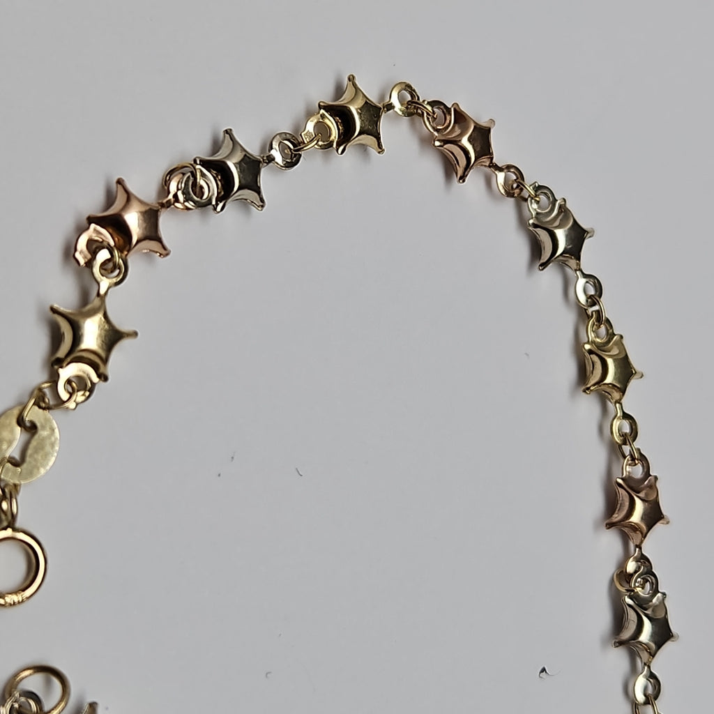 PULSERA TEJIDO ESPECIAL ESTRELLAS COMBINADAS 14K 18 CM 2.3 GR (NUEVO)