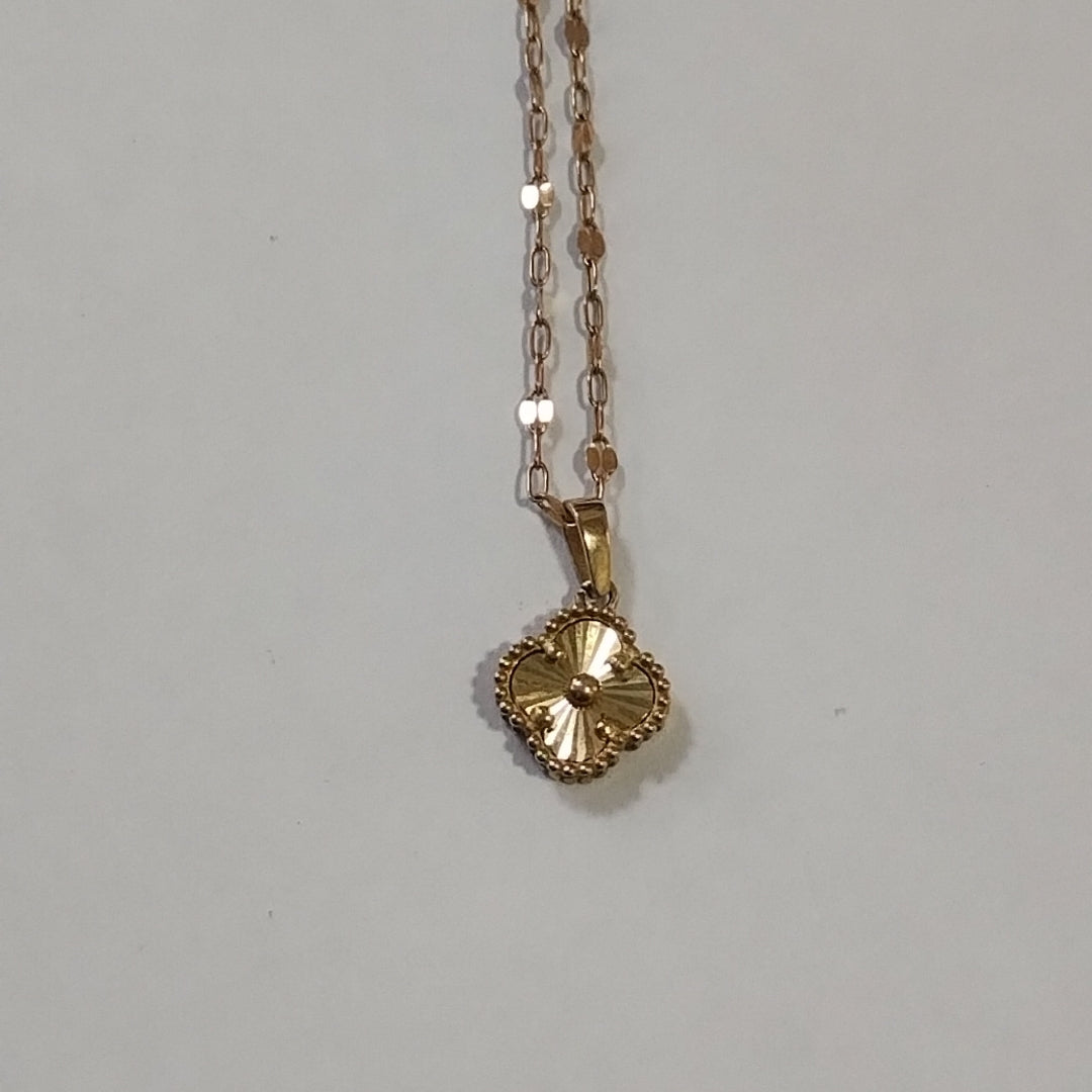 CADENA, DIJE ORO COMBINADO 10 K 2 GRMS (SEMINUEVO)