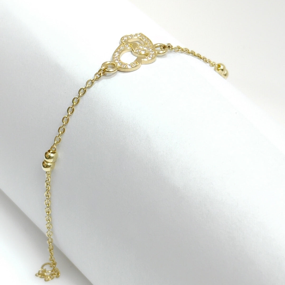 PULSERA TEJIDO ESPECIAL CORAZONES CON CIRCONIAS 14K 18 CM 2.4 GR (NUEVO)