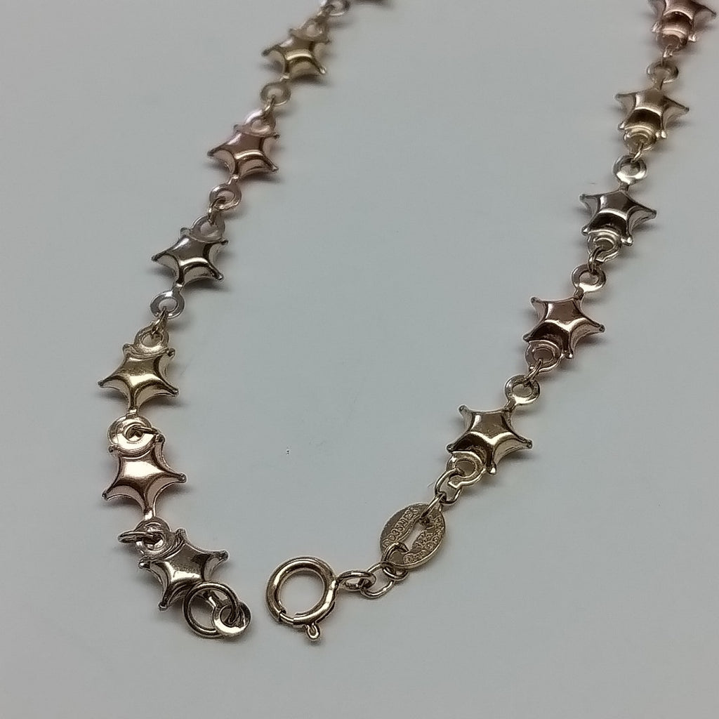 PULSERA TEJIDO ESPECIAL ESTRELLAS COMBINADAS 14K 18 CM 2.4 GR (NUEVO)
