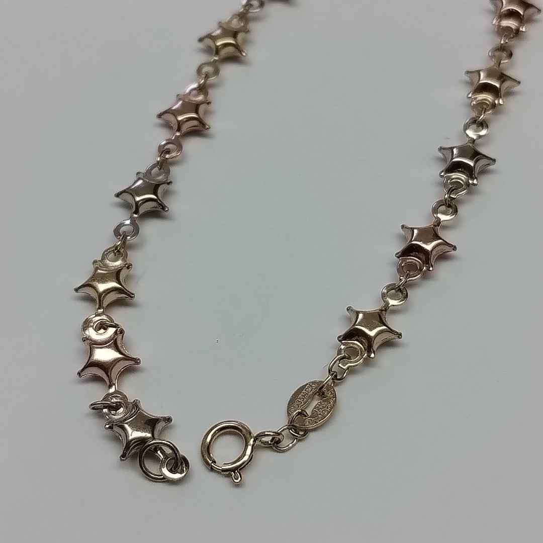 PULSERA TEJIDO ESPECIAL ESTRELLAS COMBINADAS 14K 18 CM 2.4 GR (NUEVO)