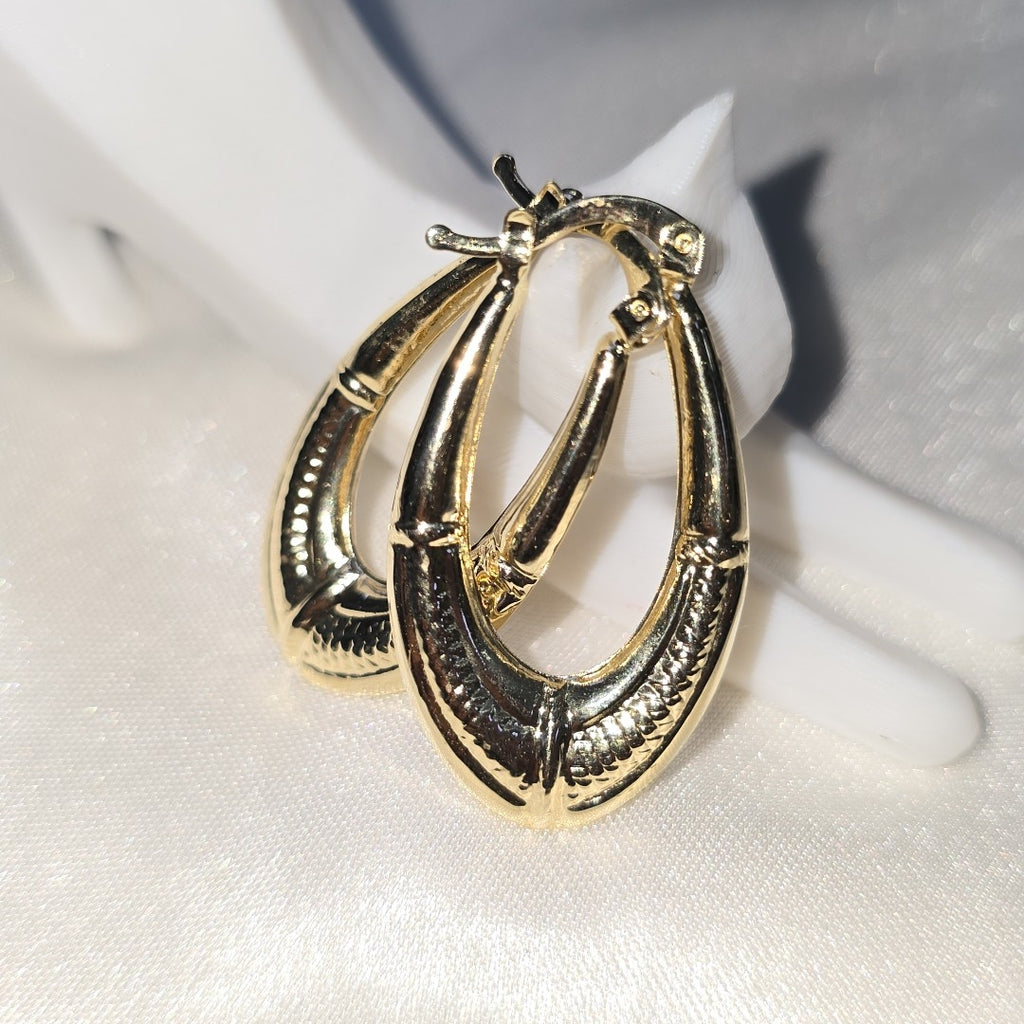 ARETES ARRACADAS ESTRIADAS 14K 2.5 GR (NUEVO)