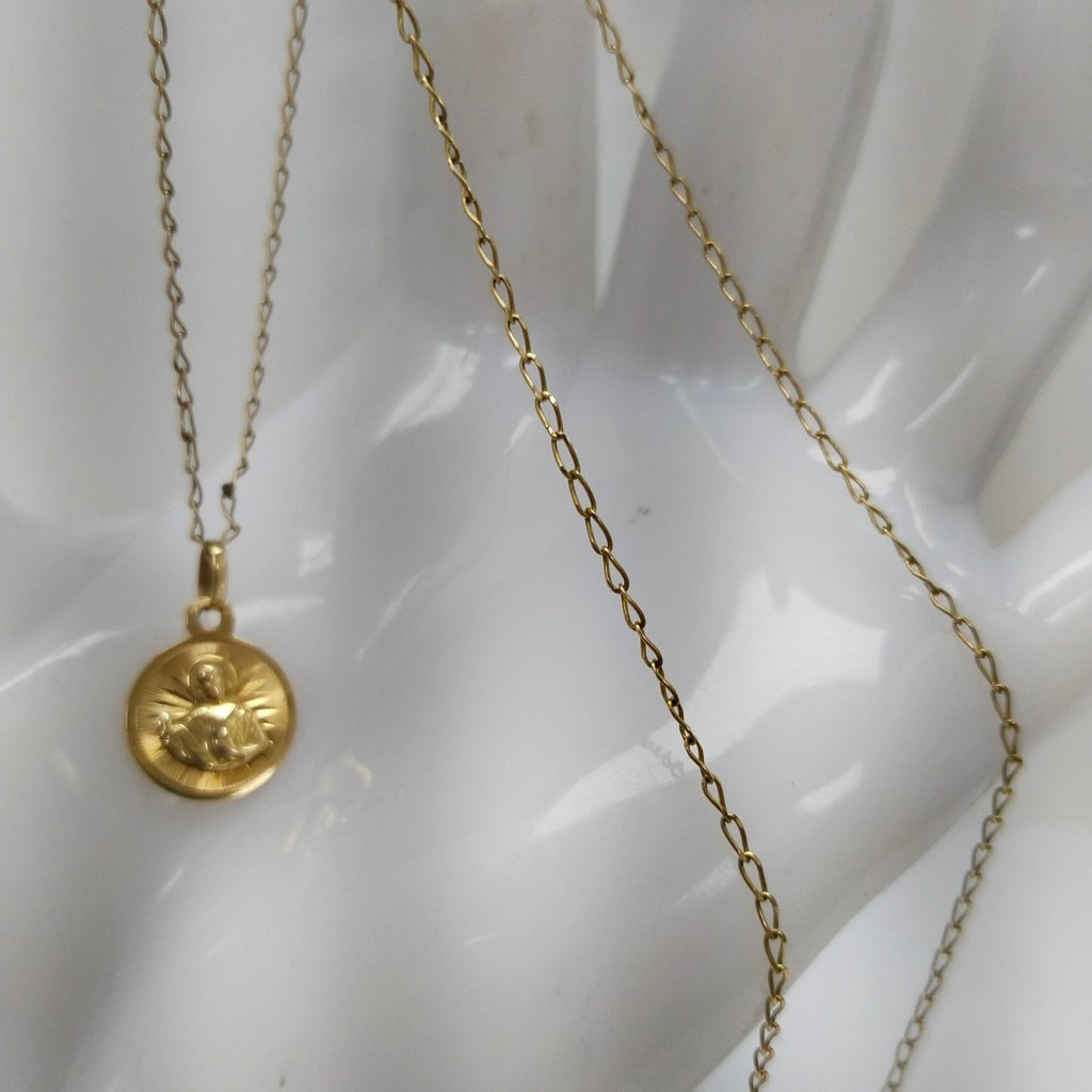CADENA,MEDALLA RELIGIOSA ORO 10 K 1,60 GRMS (SEMINUEVO)