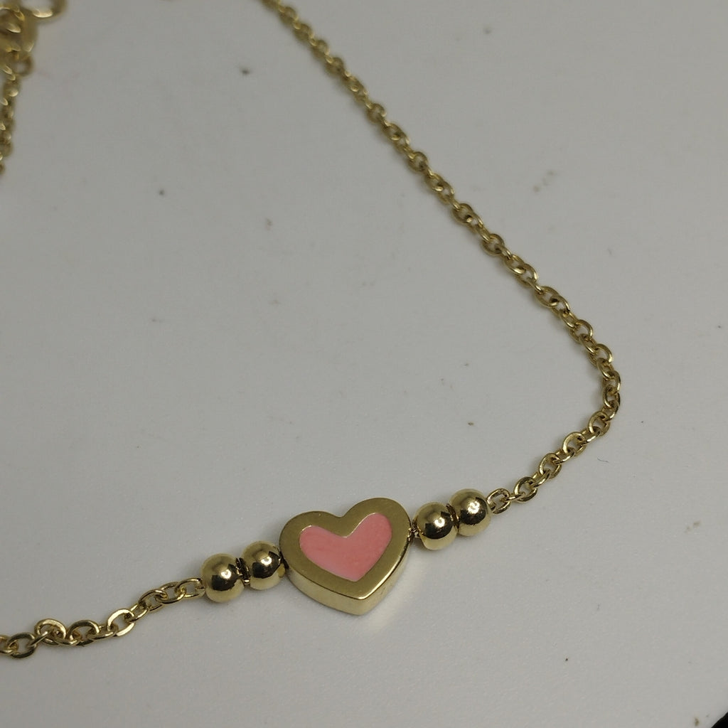 PULSERA TEJIDO ESPECIAL CON FIGURA CORAZON CON ESMALTE ROSA 14K 18 CM 2 GR (NUEVO)