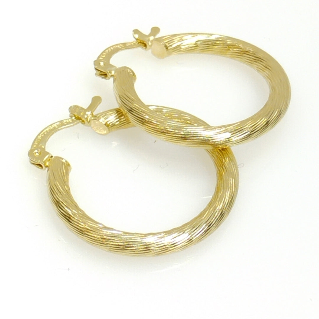 ARETES TEJIDO ARRACADAS ASTRIADAS 14K 3 GR (NUEVO)