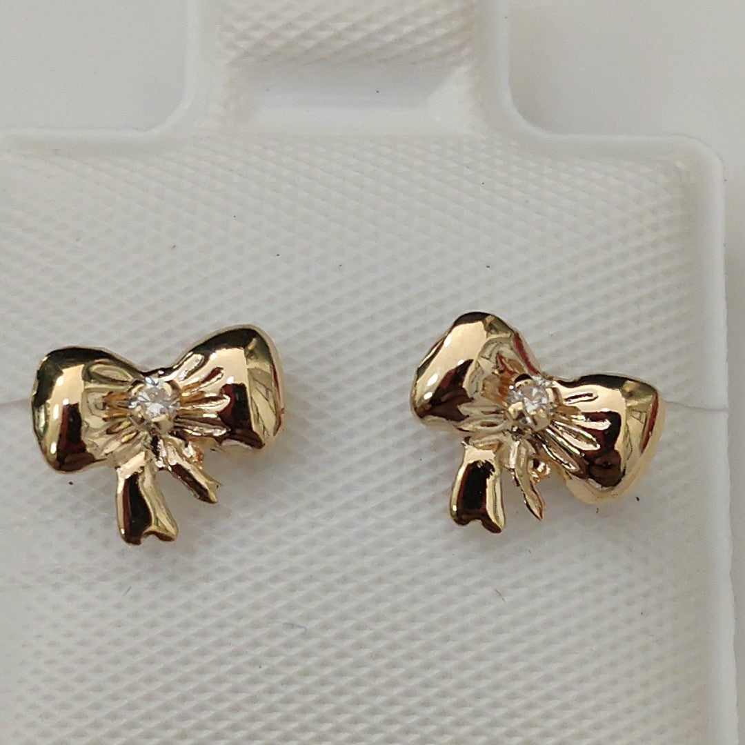 BROQUELES BROQUEL FIG MOÑO C CIRCONIA 14K 0.2441 GR (NUEVO)