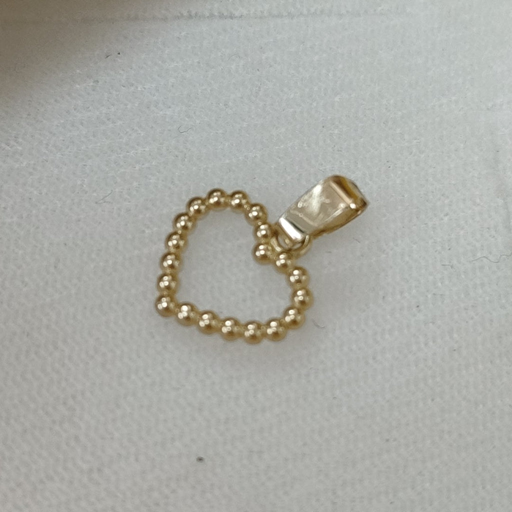 DIJE CORAZON CON CIRCONIAS 10K 0.6 GR (NUEVO)