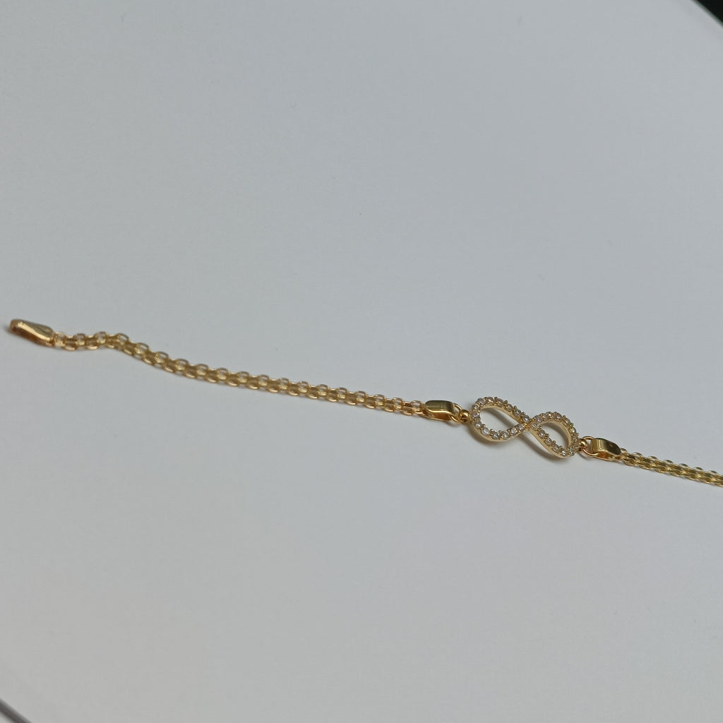 PULSERA TEJIDO ESPECIAL CON INFINITO Y CIRCONIAS 14K 18 CM 3.3 GR (NUEVO)