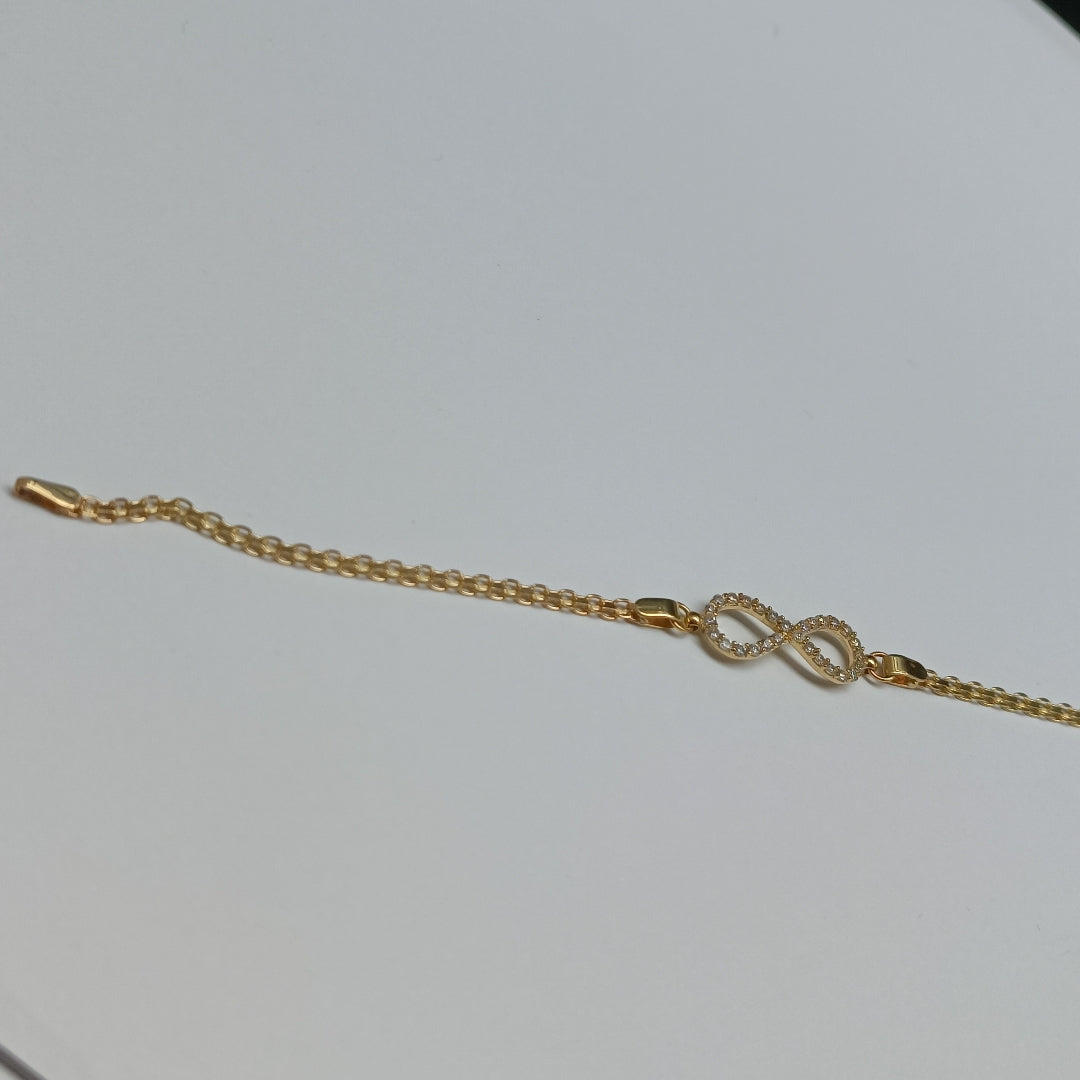 PULSERA TEJIDO ESPECIAL CON INFINITO Y CIRCONIAS 14K 18 CM 3.3 GR (NUEVO)