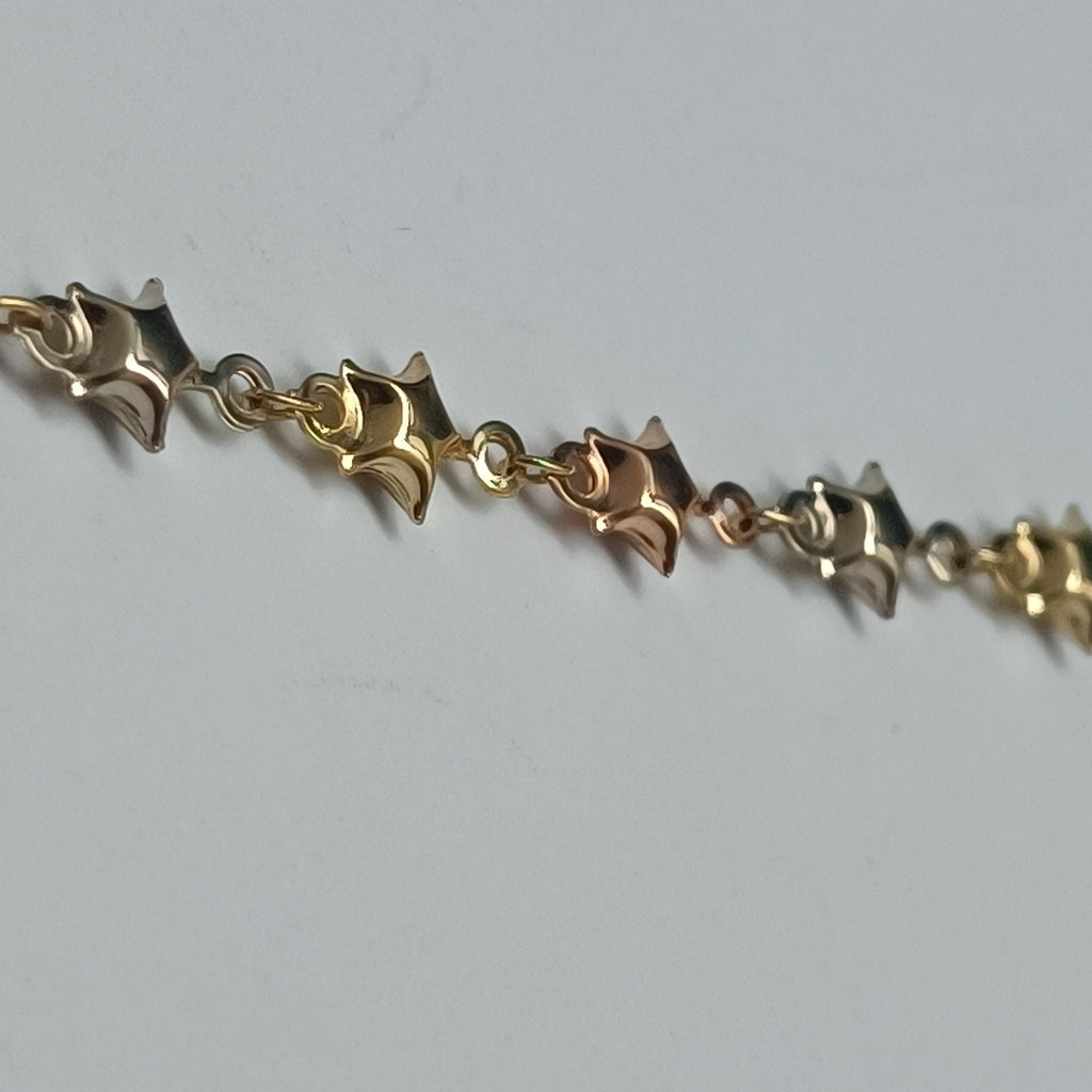 PULSERA TEJIDO ESPECIAL ESTRELLAS COMBINADAS 14K 18 CM 2.4 GR (NUEVO)
