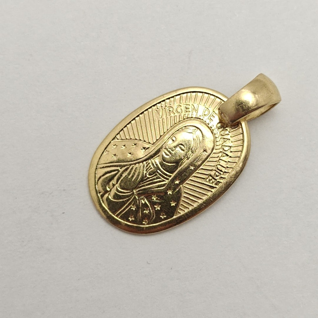 MEDALLA RELIGIOSA ORO 10 K 1.2 GRMS (SEMINUEVO)
