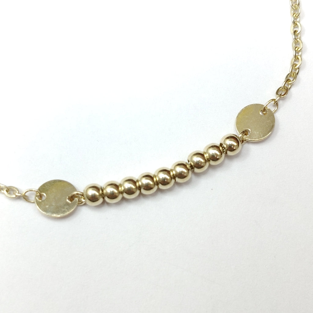 PULSERA TEJIDO ESPECIAL CON BOLITAS 14K 18 CM 1.8 GR (NUEVO)