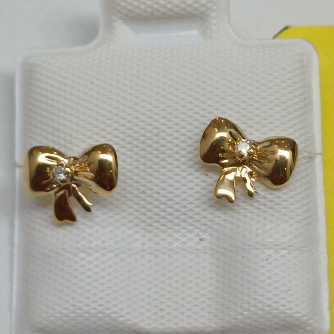 BROQUELES BROQUEL FIG MOÑO C CIRCONIA 14K 0.2441 GR (NUEVO)