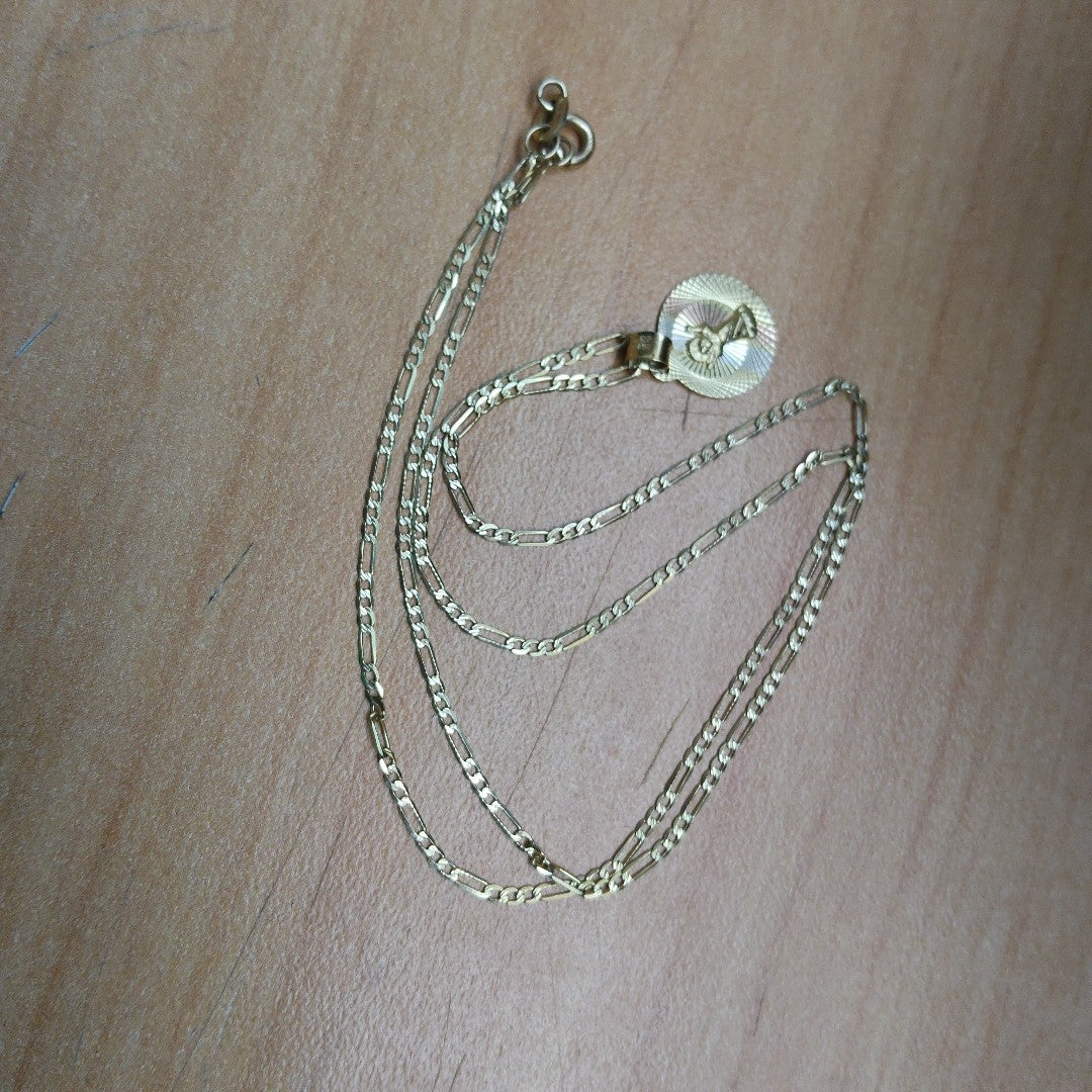 CADENA,MEDALLA RELIGIOSA ORO 10 K 1,90 GRMS (SEMINUEVO)