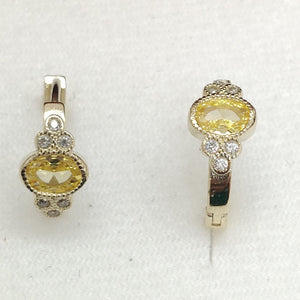ARETES ARRACADAS CON CIRCONIAS Y PDRAS COL 14K 3.3 GR (NUEVO)