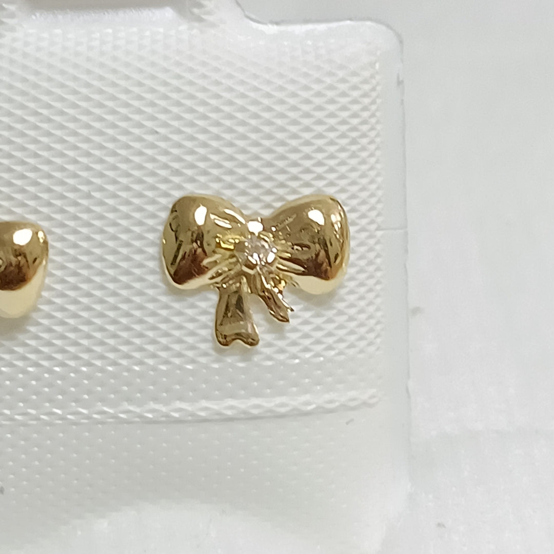 BROQUELES BROQUEL FIG MOÑO C CIRCONIA 14K 0.2441 GR (NUEVO)