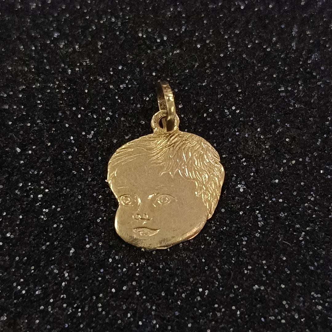 DIJE ORO 10 K 0.6 GRMS (SEMINUEVO)