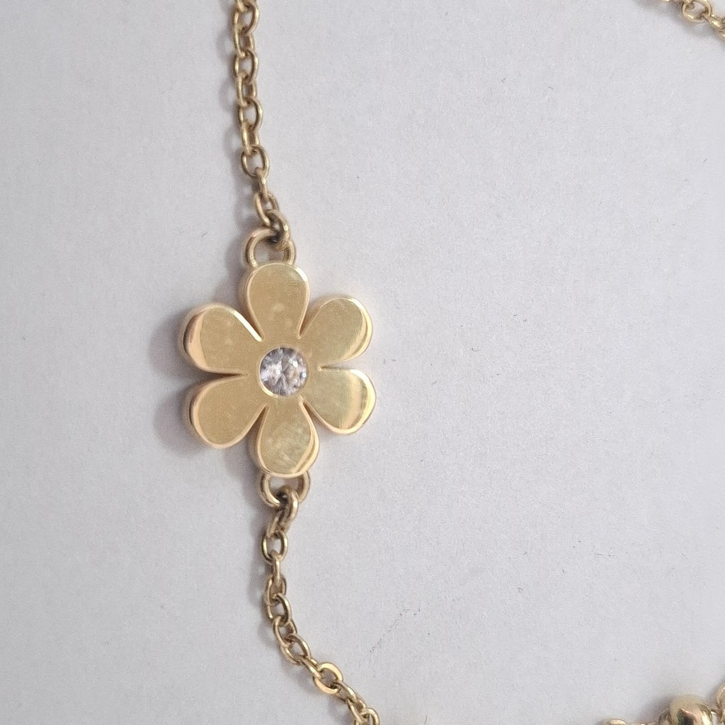 PULSERA TEJIDO ESPECIAL FLOR CON CIRCONIA 14K 18 CM 2.5 GR (NUEVO)