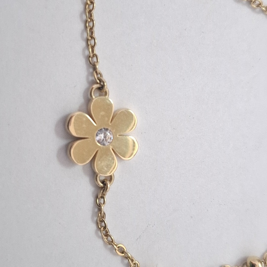 PULSERA TEJIDO ESPECIAL FLOR CON CIRCONIA 14K 18 CM 2.5 GR (NUEVO)