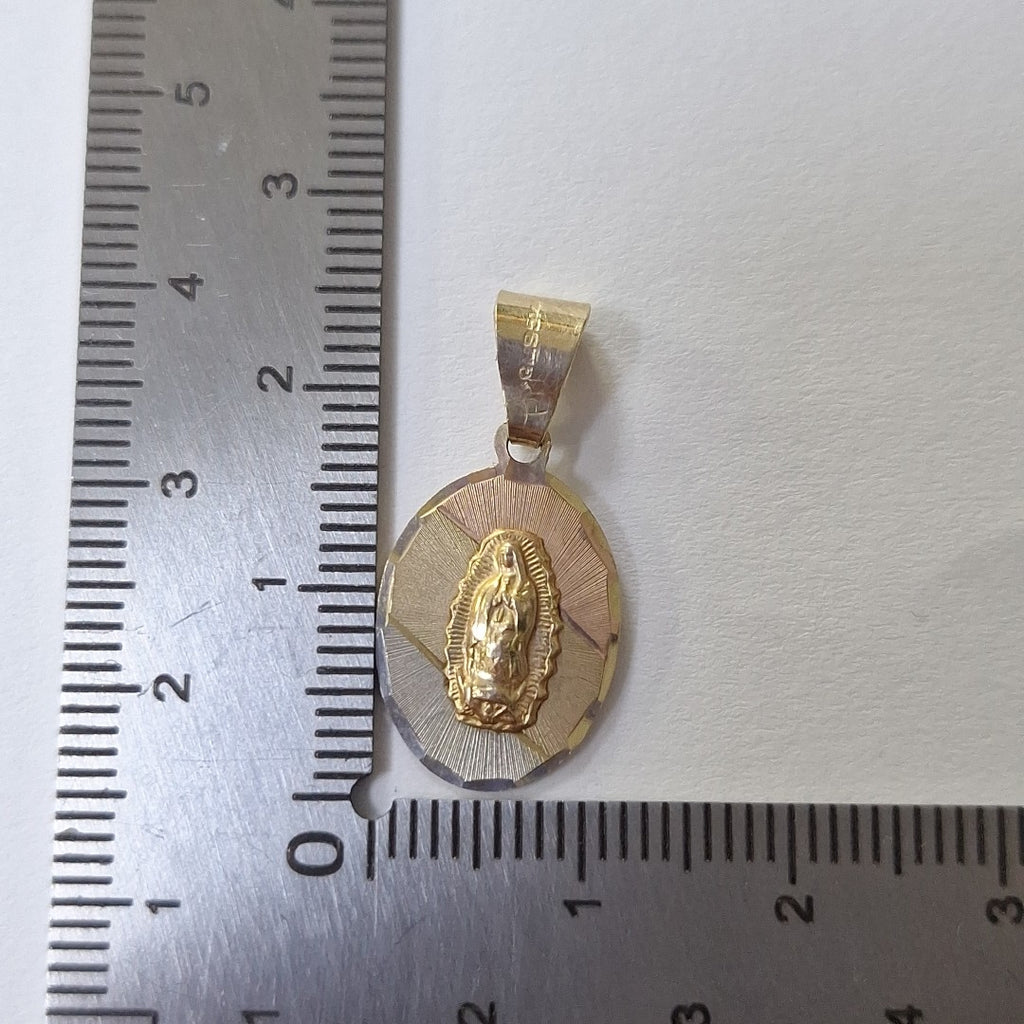 DIJE,MEDALLA RELIGIOSA ORO 14 K 1,20 GRMS (SEMINUEVO)