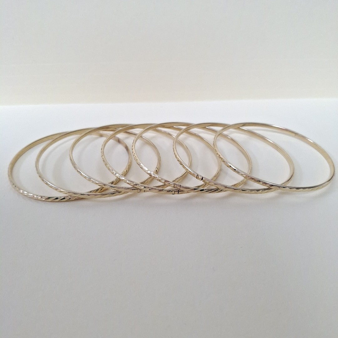 SEMANARIO DE ARGOLLAS,SEMANARIO DE PULSERAS ORO 10 K 22,90 GRMS (SEMINUEVO)