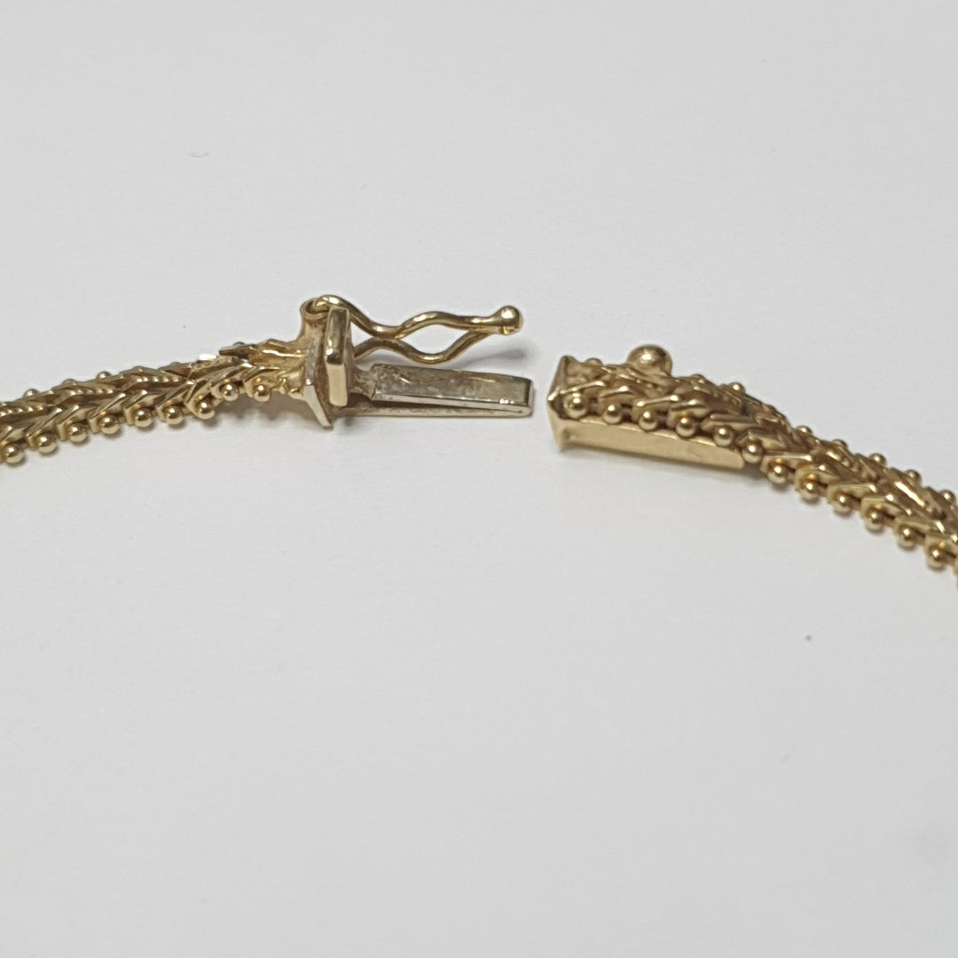 PULSERA ORO COMBINADO 14 K 7.2 GRMS (SEMINUEVO)
