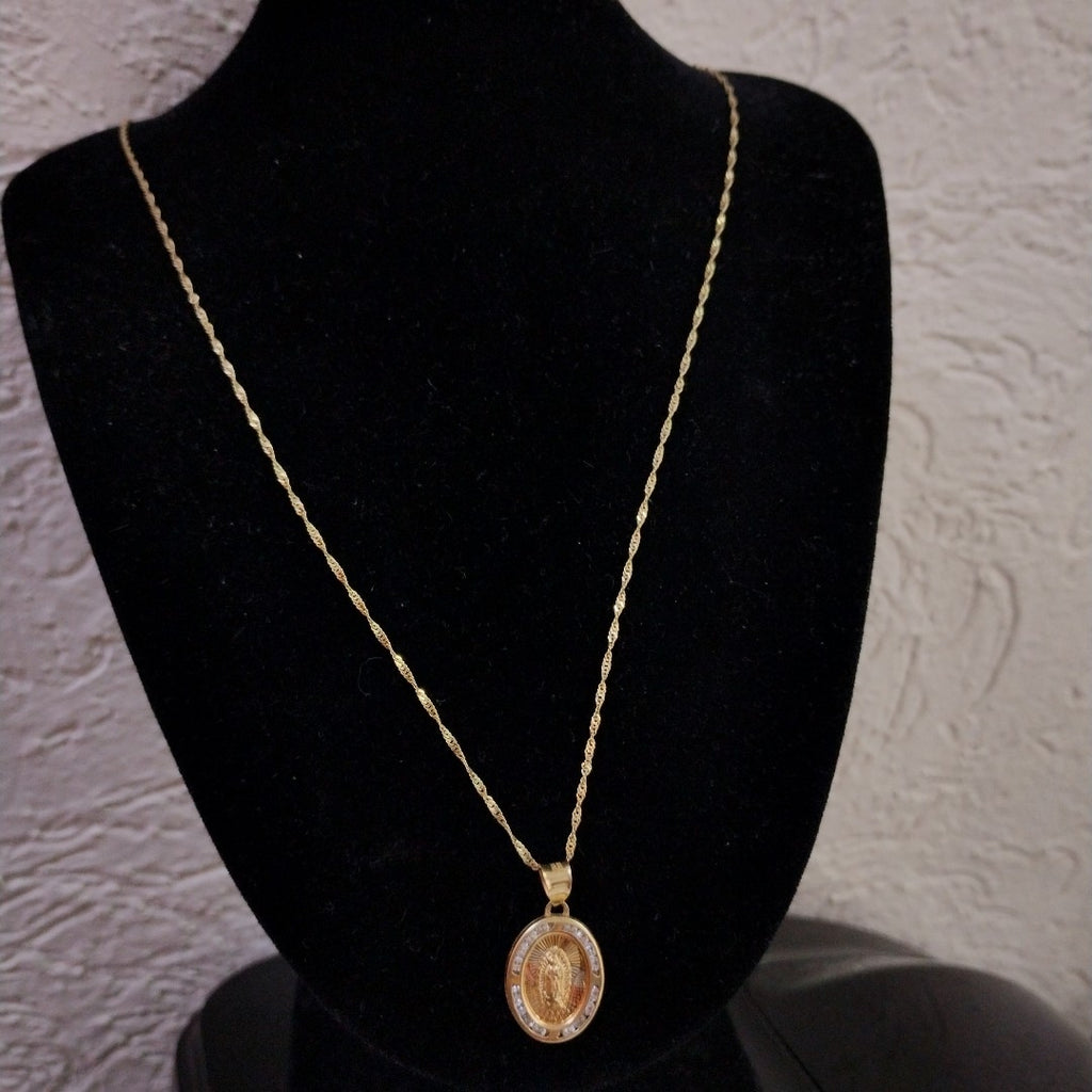 CADENA,MEDALLA RELIGIOSA ORO 10 K 2,10 GRMS (SEMINUEVO)