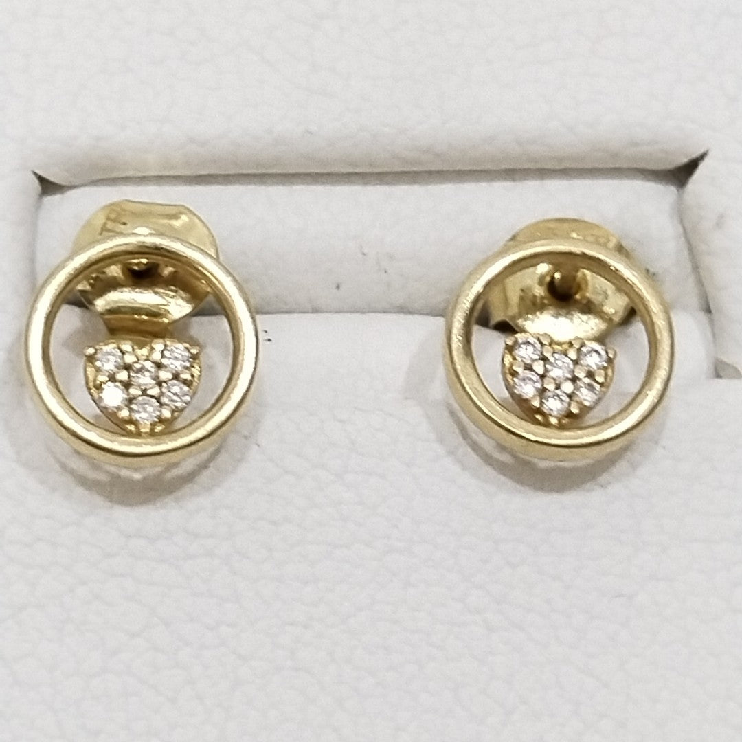 10024BRO00000B1116 FRD6 BROQUEL DE CIRCULO CON CORAZON DE CIRCONIAS ORO 14K 1.1GRS (NUEVO)